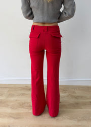 small red flap-pocket flared trousers — photographed on Lily