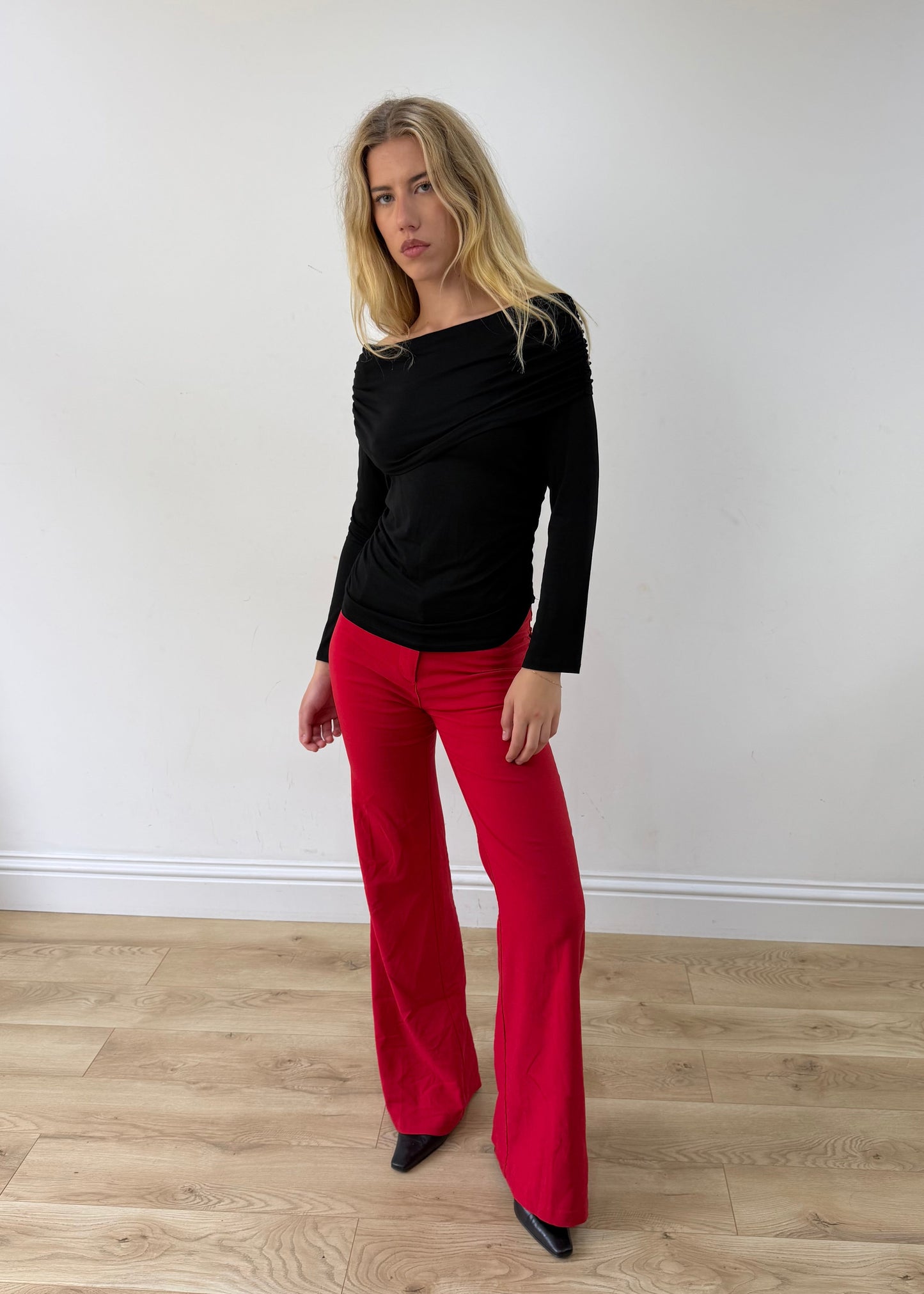 small/medium black off-shoulder long-sleeve top — photographed on Lily