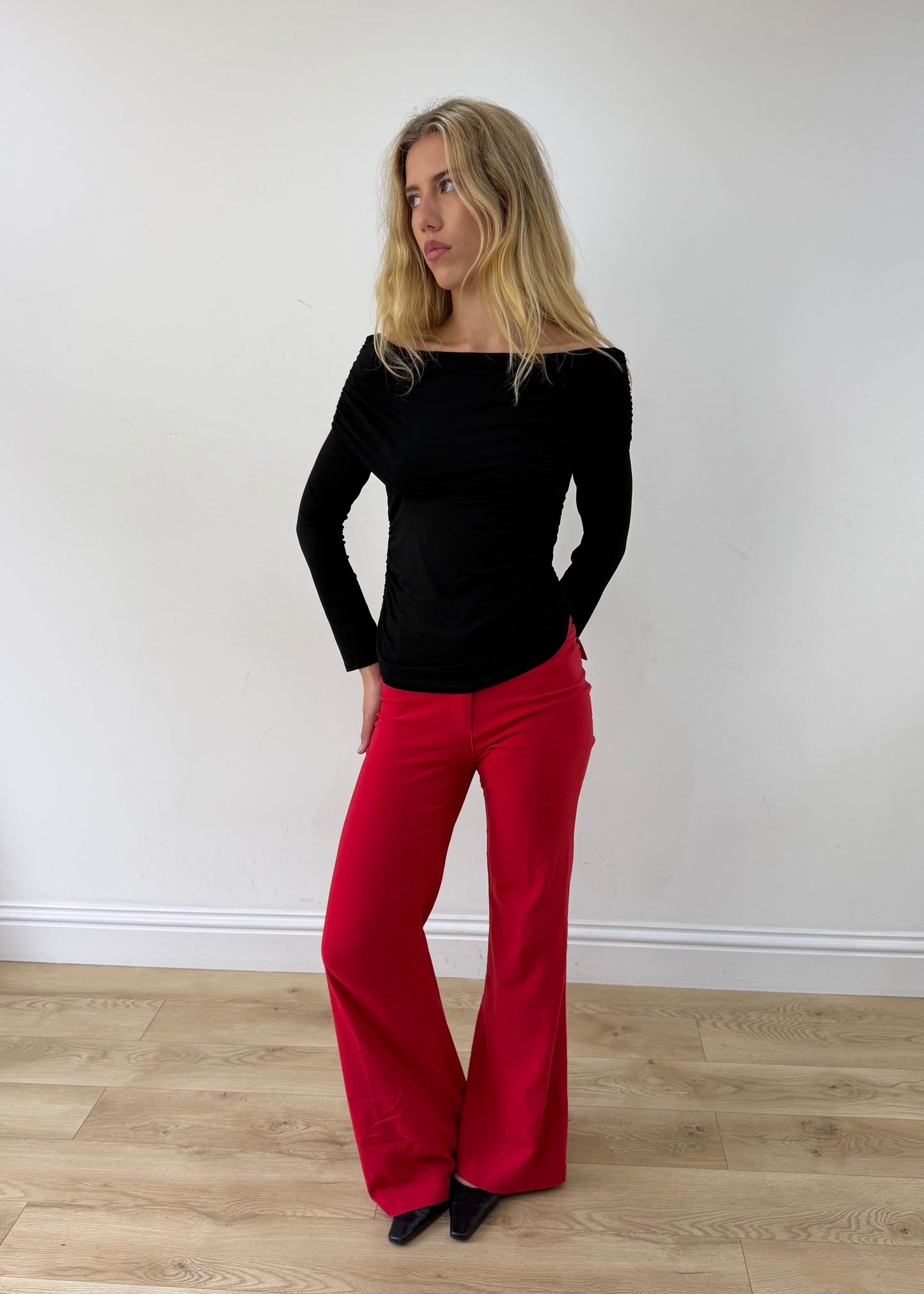 small/medium black off-shoulder long-sleeve top — photographed on Lily