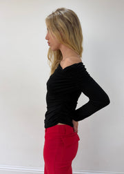 small/medium black off-shoulder long-sleeve top — photographed on Lily