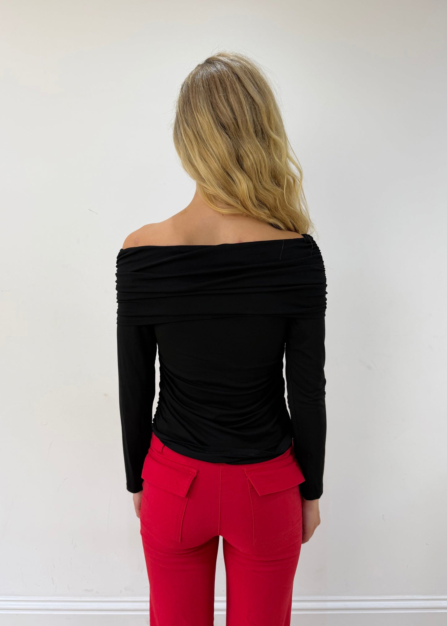 small/medium black off-shoulder long-sleeve top — photographed on Lily