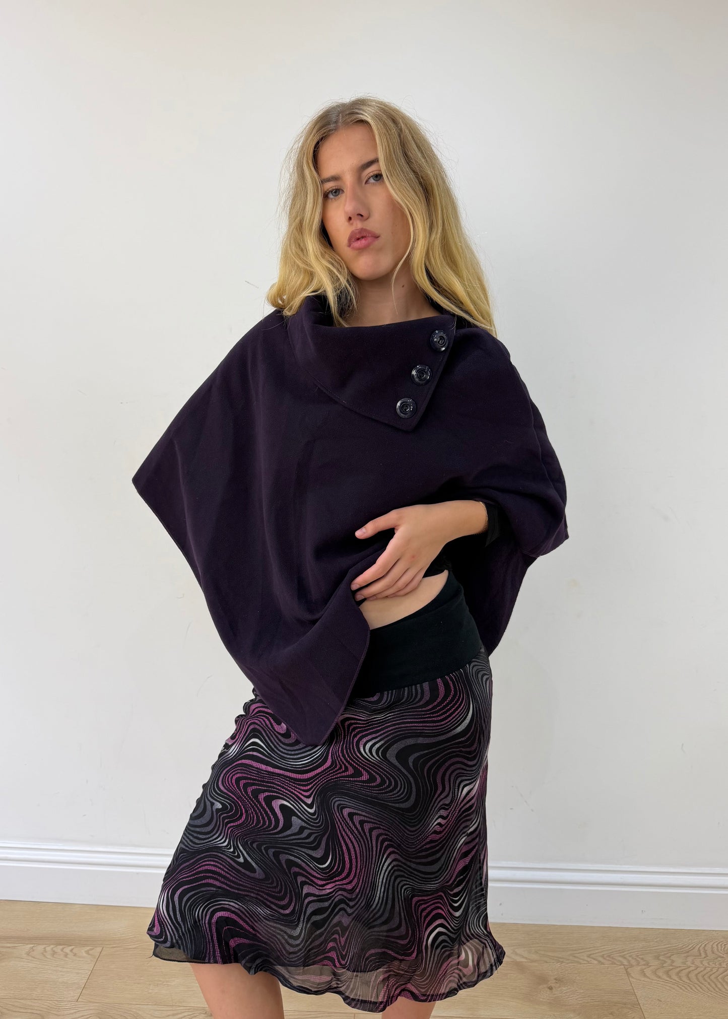one size dark purple button-detail asymmetric poncho — photographed on Lily