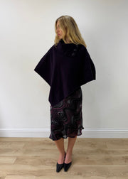 one size dark purple button-detail asymmetric poncho — photographed on Lily