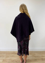 one size dark purple button-detail asymmetric poncho — photographed on Lily