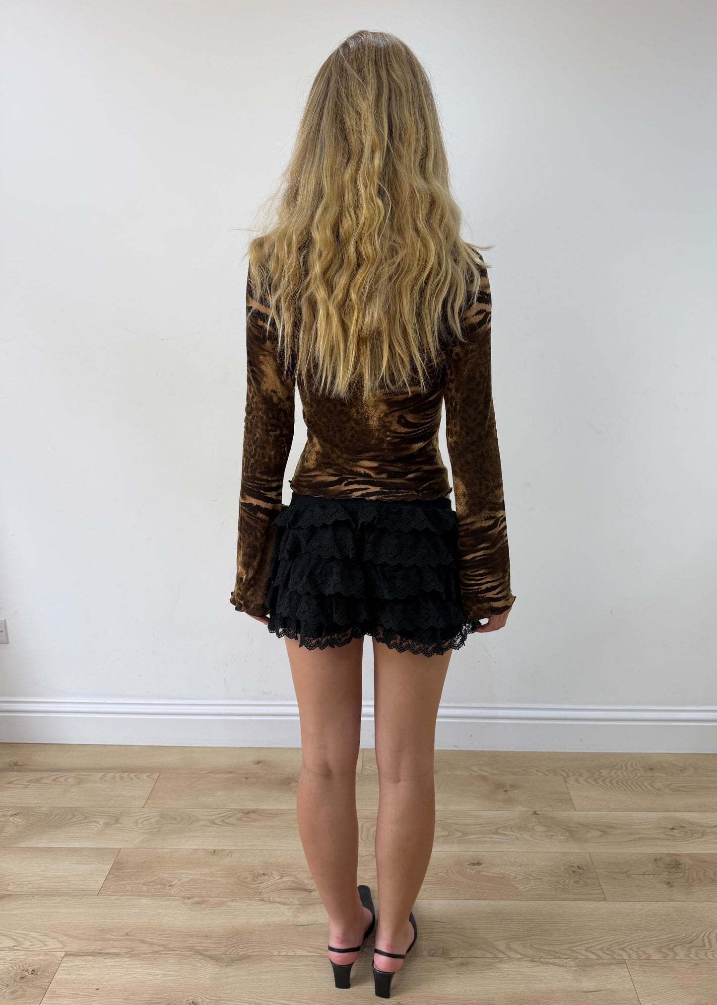small brown zebra-print long-sleeve top — photographed on Lily