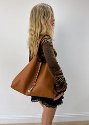one size tan studded large shoulder bag — photographed on Lily