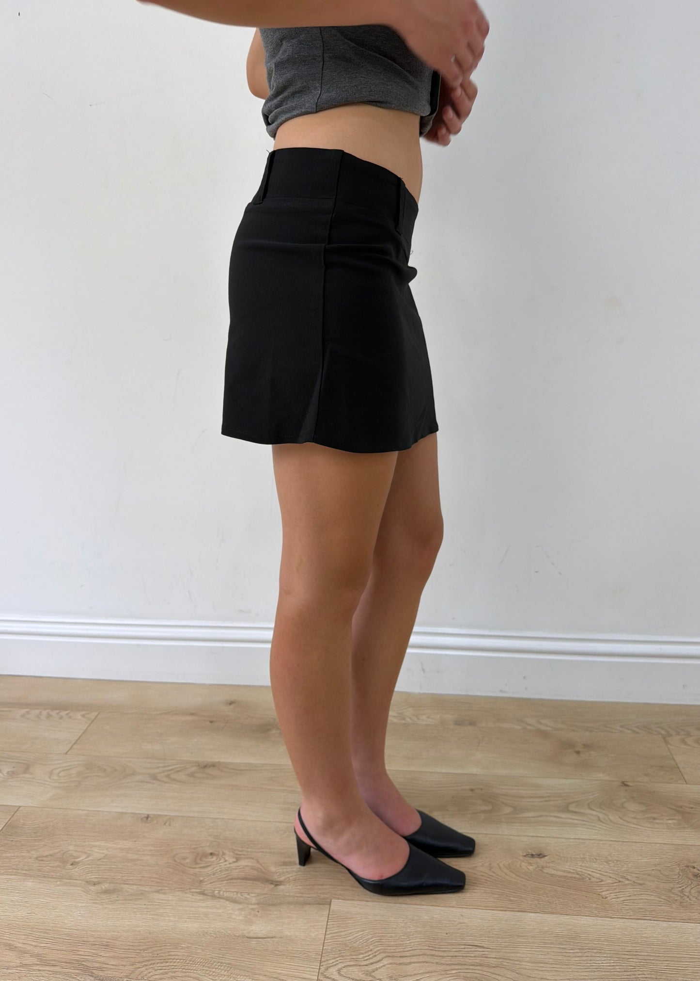 small black tailored mini skirt — photographed on Lily
