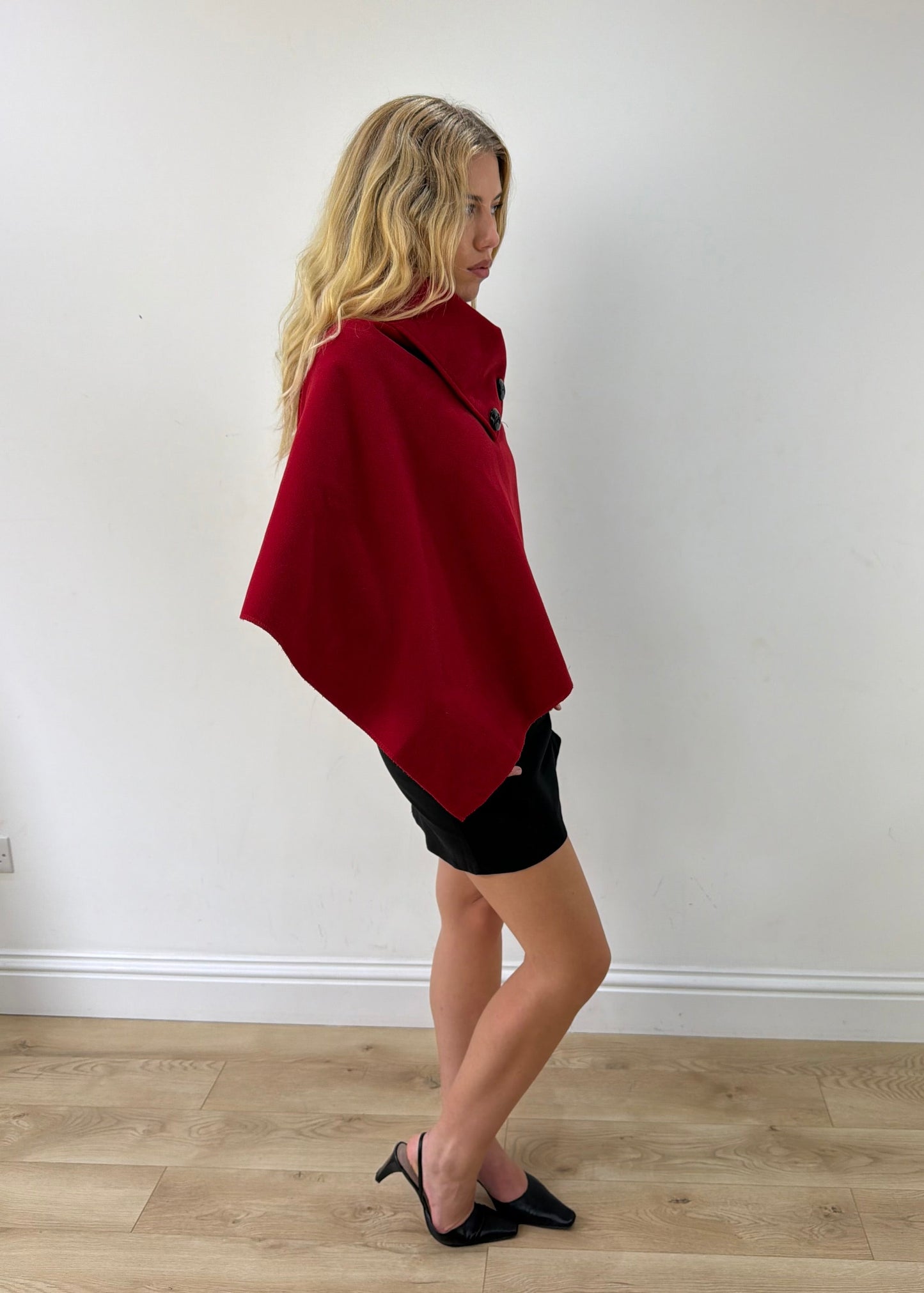 one size red button-detail asymmetric poncho — photographed on Lily