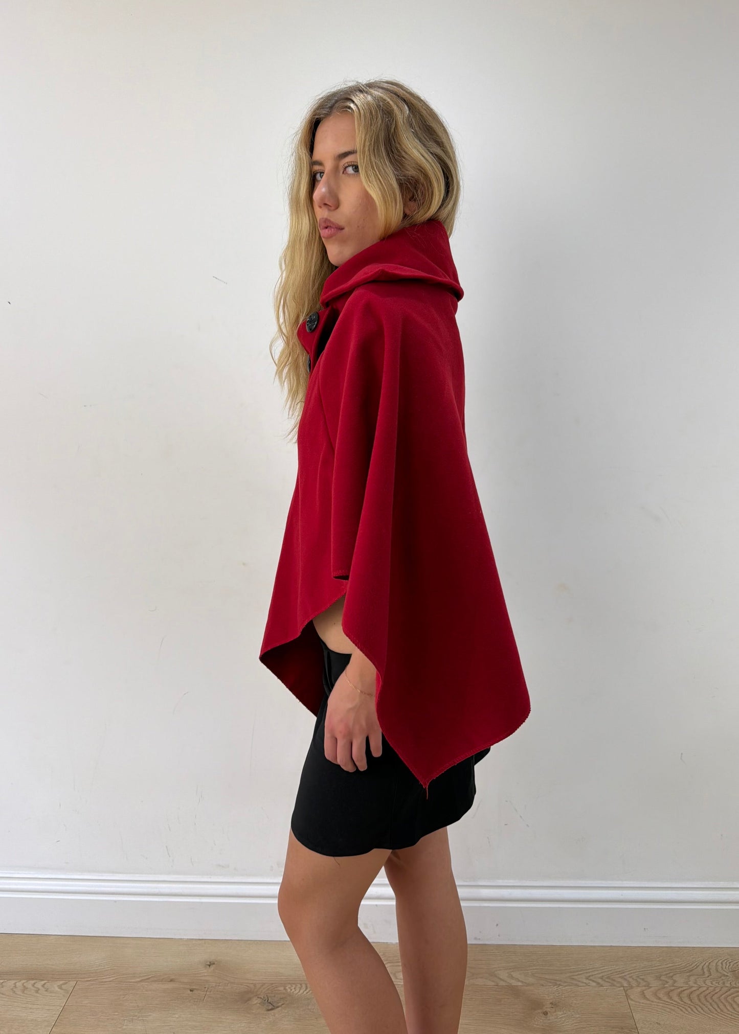 one size red button-detail asymmetric poncho — photographed on Lily