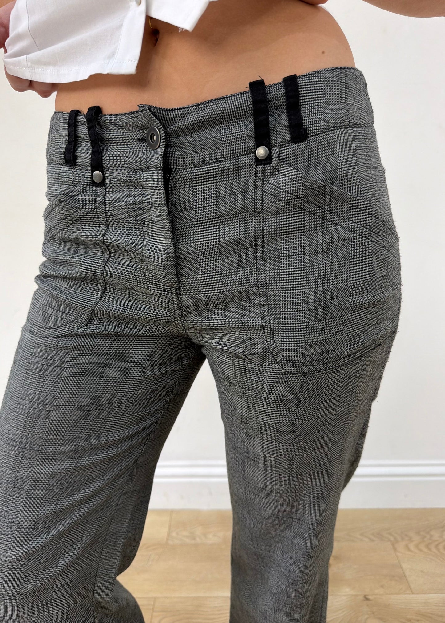 small grey check bootcut trousers — photographed on Lily