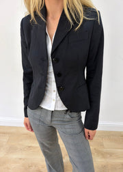 small black cropped single-button blazer — photographed on Lily