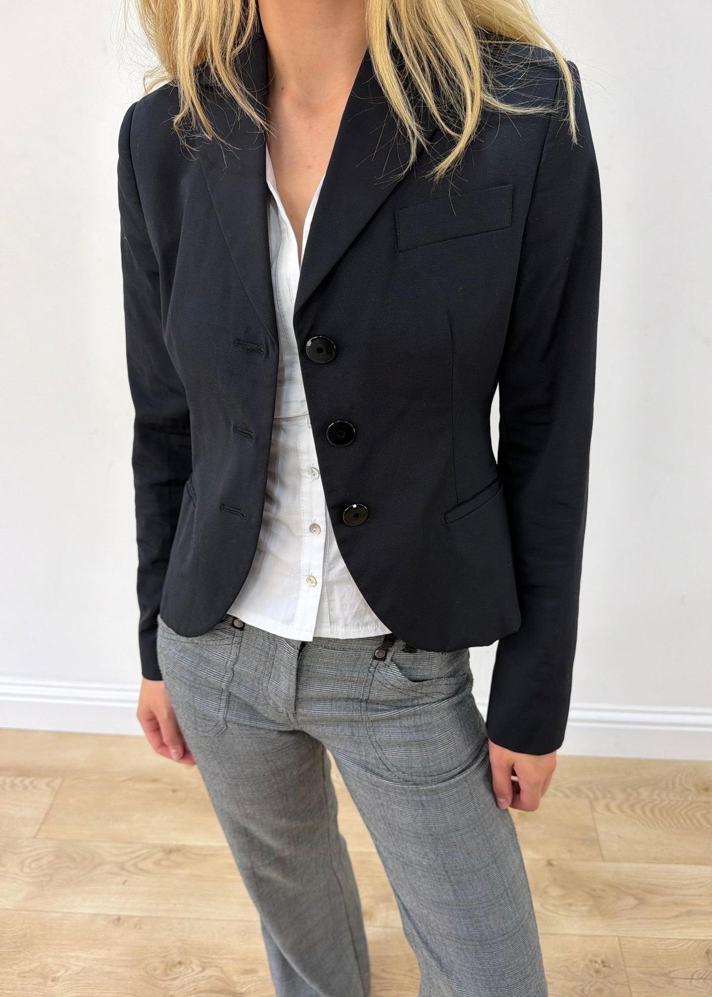 small black cropped single-button blazer — photographed on Lily