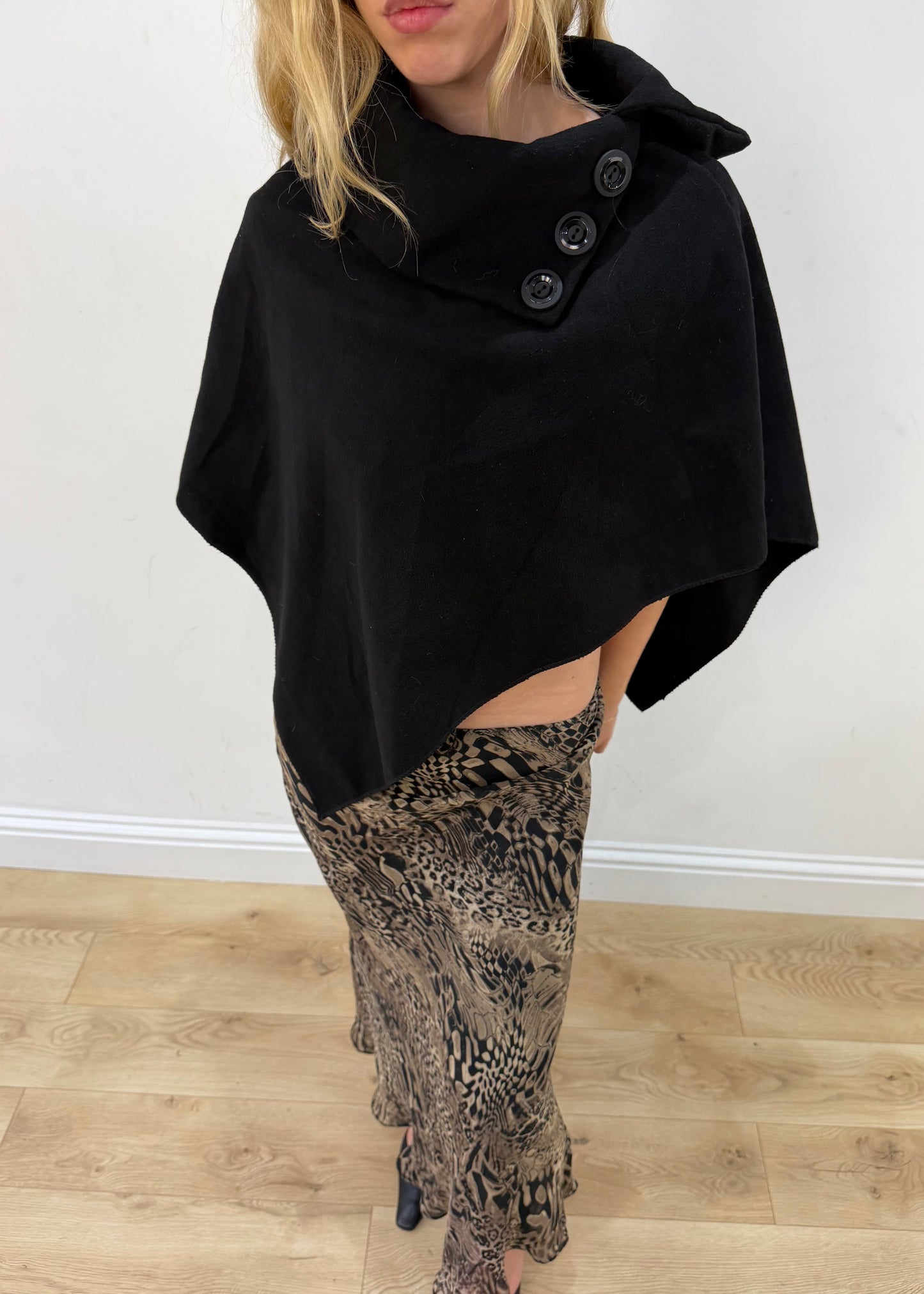 one size black button-detail asymmetric poncho — photographed on Lily