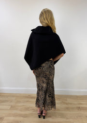 one size black button-detail asymmetric poncho — photographed on Lily