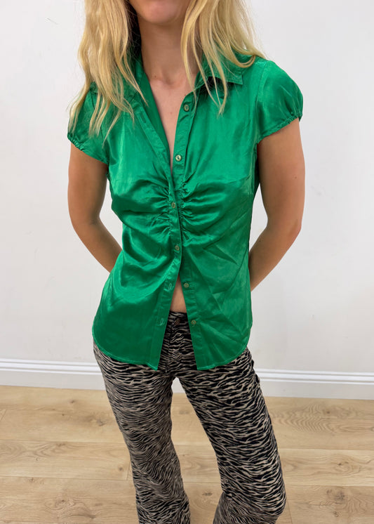 medium emerald green satin-style fitted short-sleeve shirt — photographed on Lily