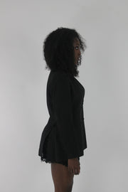 alternate-side view of black pinstripe single-button blazer