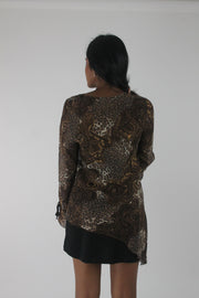 back view of brown paisley-print sheer asymmetric tunic top