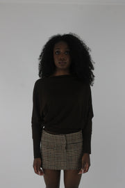 front view of dark brown boat-neck long-sleeve top