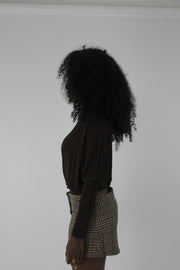 side view of dark brown boat-neck long-sleeve top