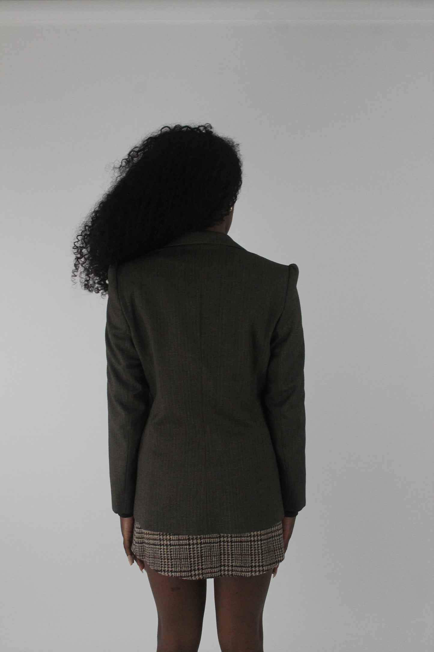 back view of dark olive single-button blazer