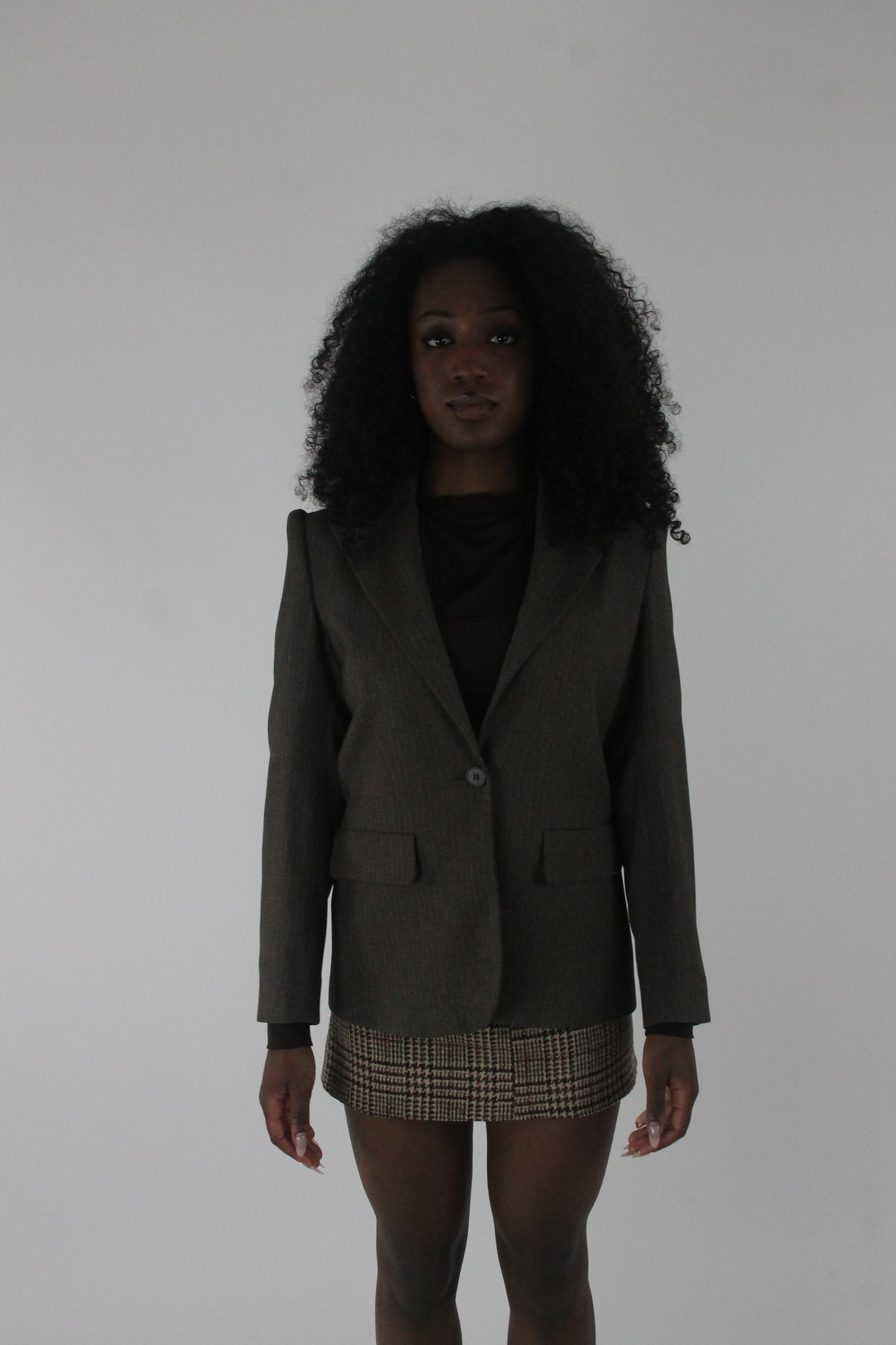 front view of dark olive single-button blazer
