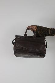 back view of dark brown structured handbag