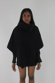 front view of dark purple button-detail asymmetric poncho