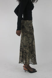 alternate-side view of beige and black animal-print mesh midi skirt