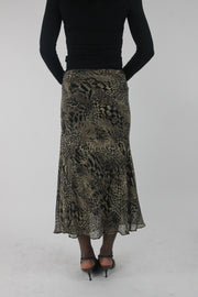 back view of beige and black animal-print mesh midi skirt