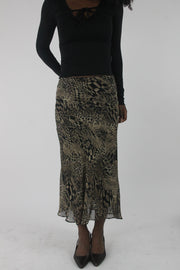 front view of beige and black animal-print mesh midi skirt