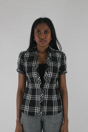 front view of black and white plaid short-sleeve fitted blazer
