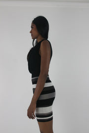 detail view of black and white striped cowl-neck sleeveless mini dress