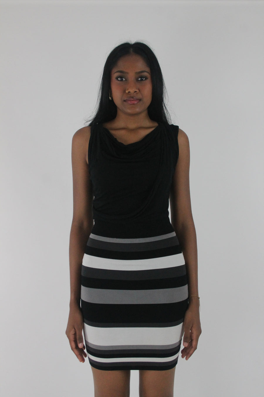 front view of black and white striped cowl-neck sleeveless mini dress