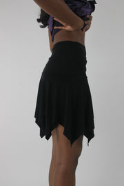side view of black asymmetric handkerchief-hem skirt
