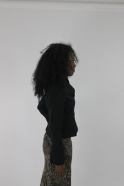 alternate-side view of black cropped single-button blazer