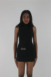 front view of black high-neck sleeveless buckle-detail mini dress
