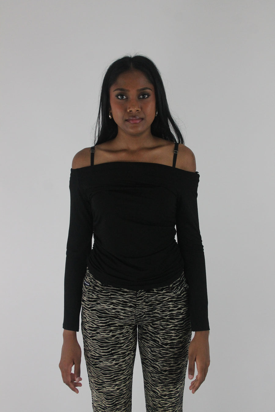 front view of black off-shoulder long-sleeve top