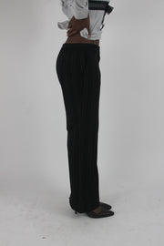 alternate-side view of black pinstripe wide-leg trousers