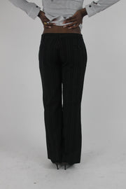 back view of black pinstripe wide-leg trousers