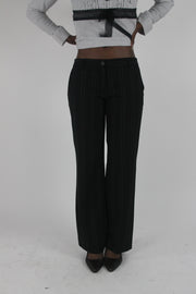 front view of black pinstripe wide-leg trousers