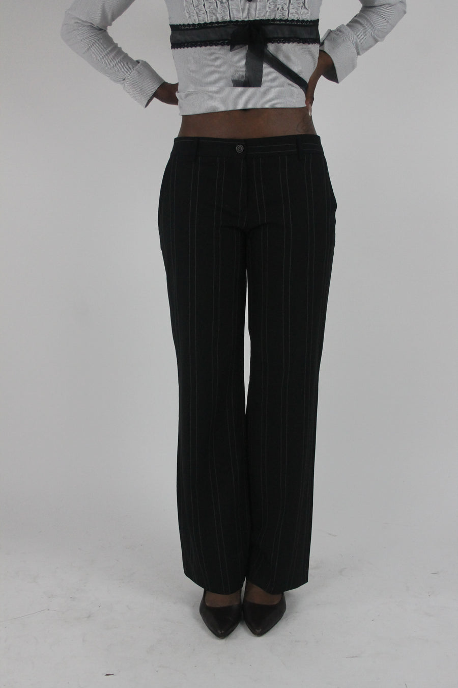 front view of black pinstripe wide-leg trousers