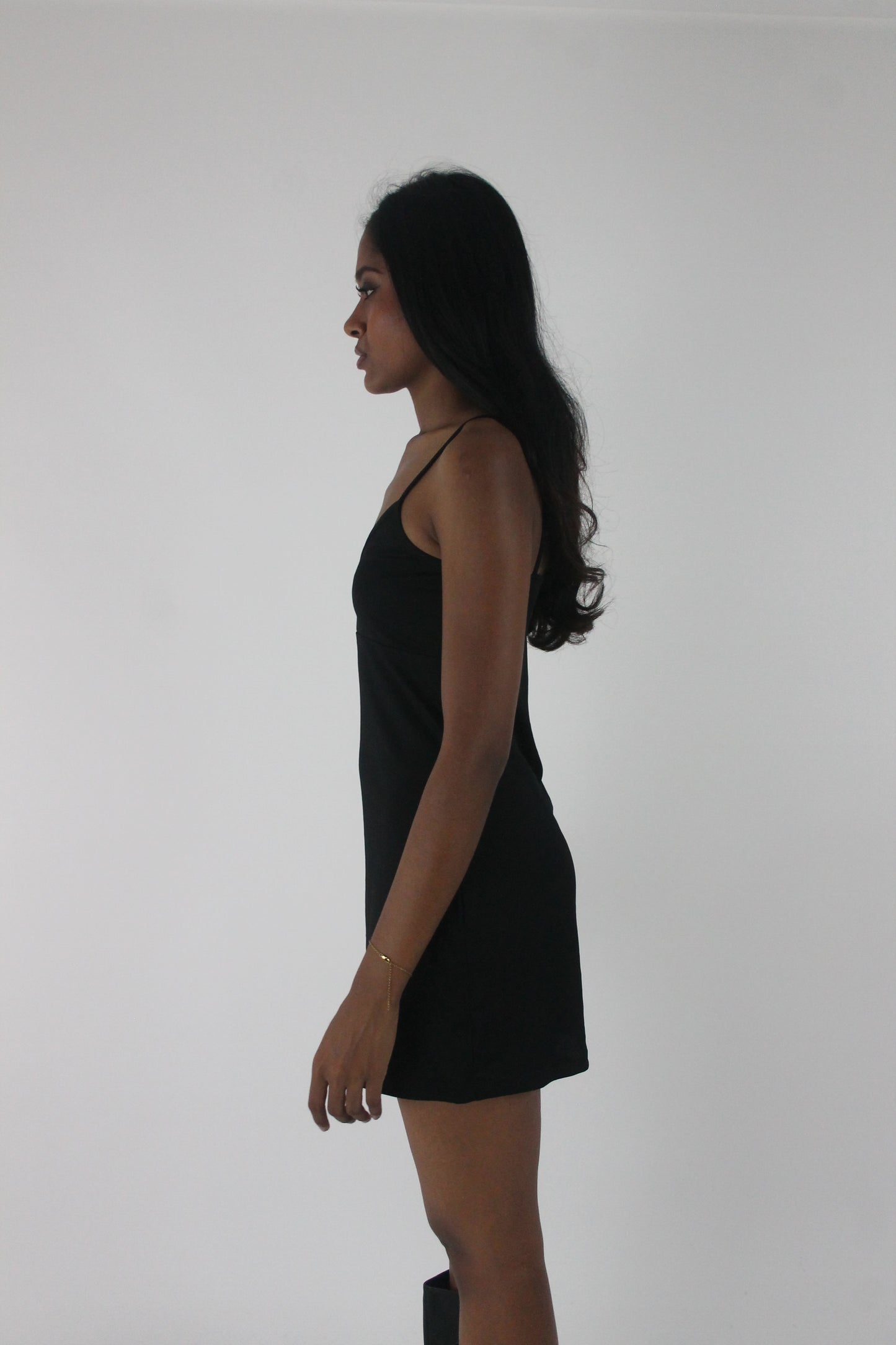 alternate-side view of black satin-effect camisole mini dress
