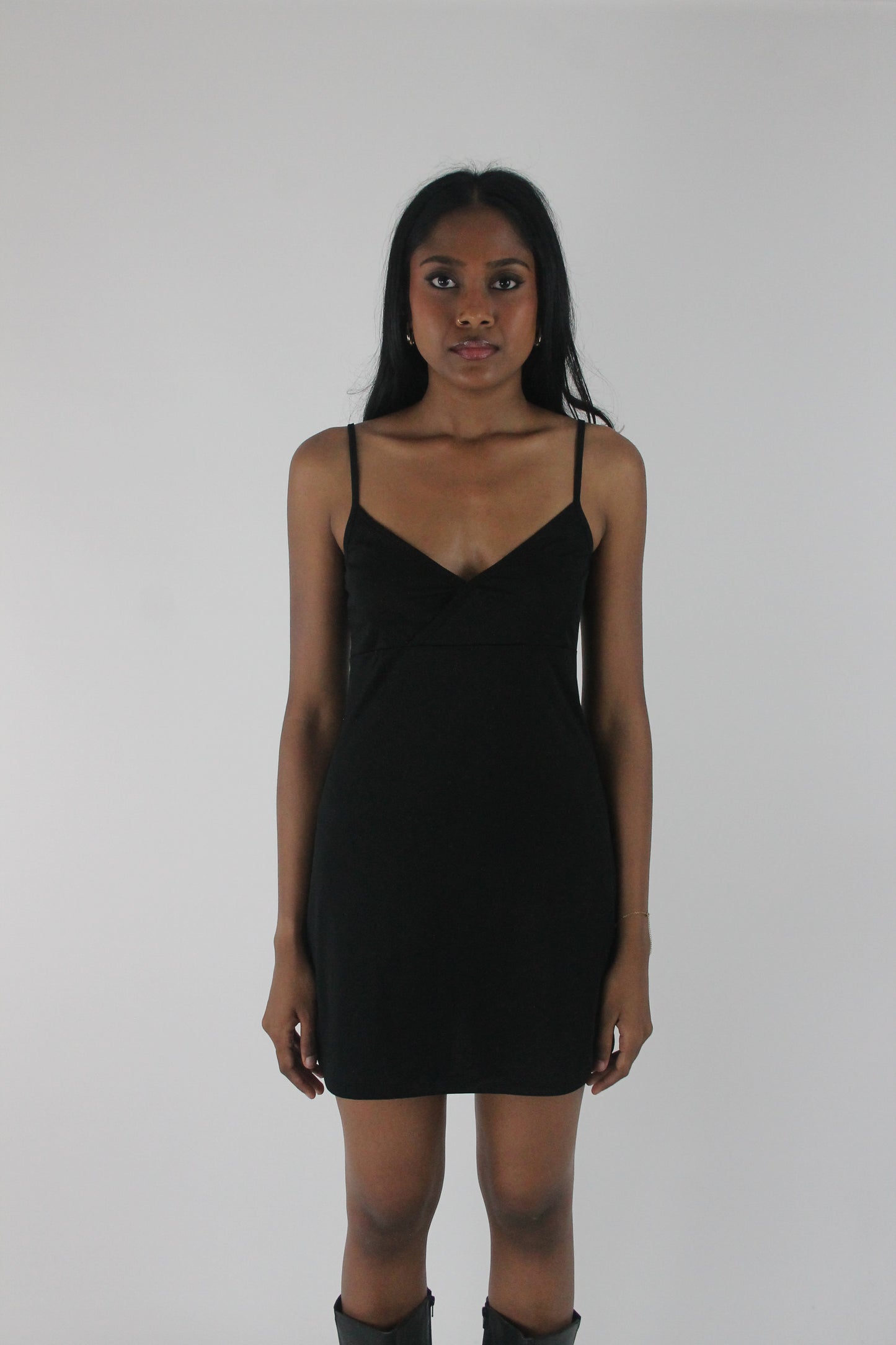front view of black satin-effect camisole mini dress