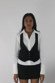 front view of black studded racerback cropped waistcoat