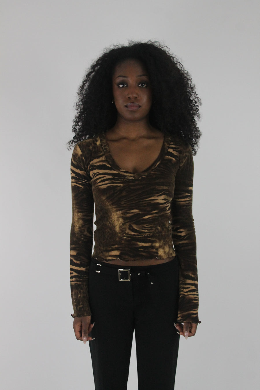 front view of brown zebra-print long-sleeve top
