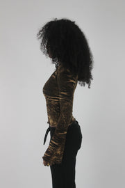 side view of brown zebra-print long-sleeve top