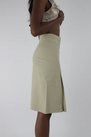 side view of cream high-waisted side-slit midi skirt