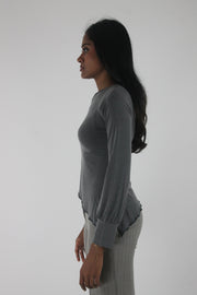 alternate-side view of grey asymmetric one-shoulder long-sleeve top