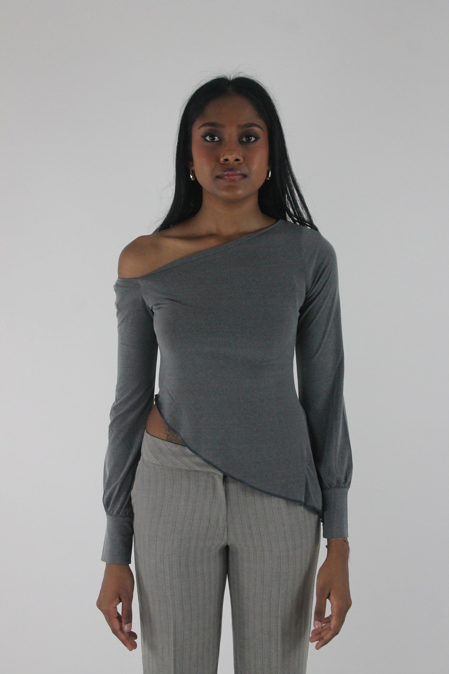 front view of grey asymmetric one-shoulder long-sleeve top
