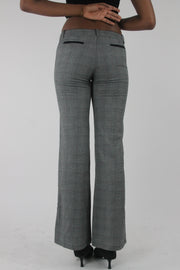 back view of grey check bootcut trousers